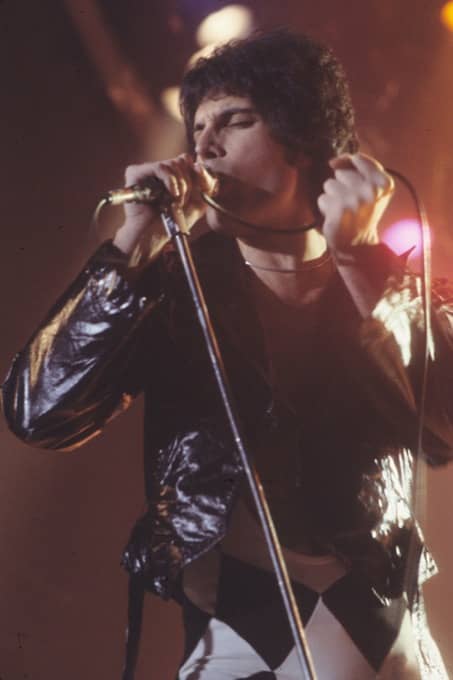 Freddie Mercury performing on stage in 1977